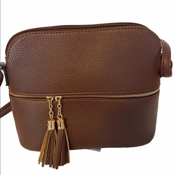 Crossbody or shoulder purse. New